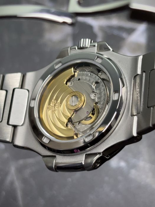 Часы Rolex, Patek Philippe