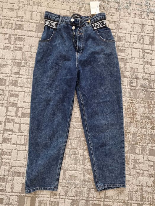 Продам женские джинсы
