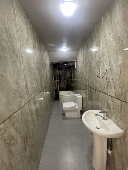Sergeli Xonobodda uchastka sotiladi 7 xona 4 sanuzel podklyuch