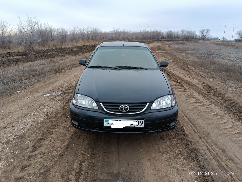 Тойота авенсис .