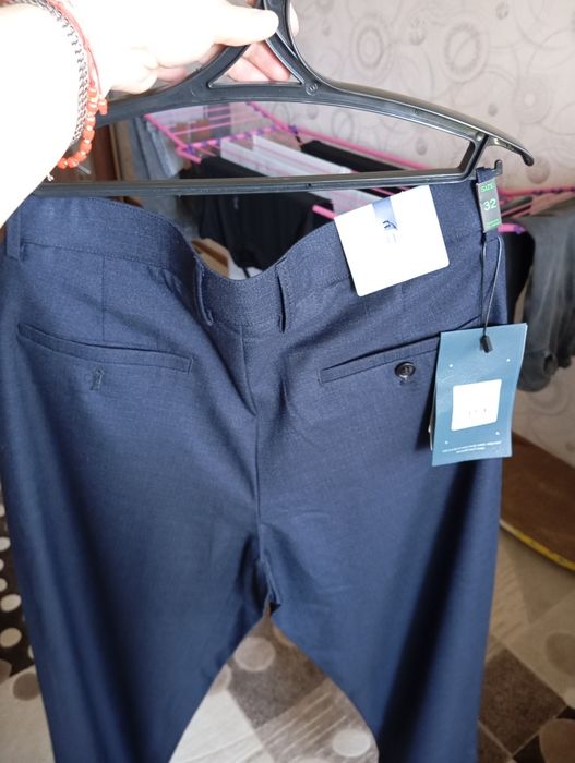 Продам брюки новые