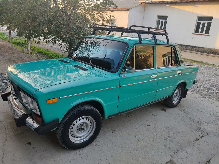 2106 mashina xolati yaxshi metan benzida xam yuradi