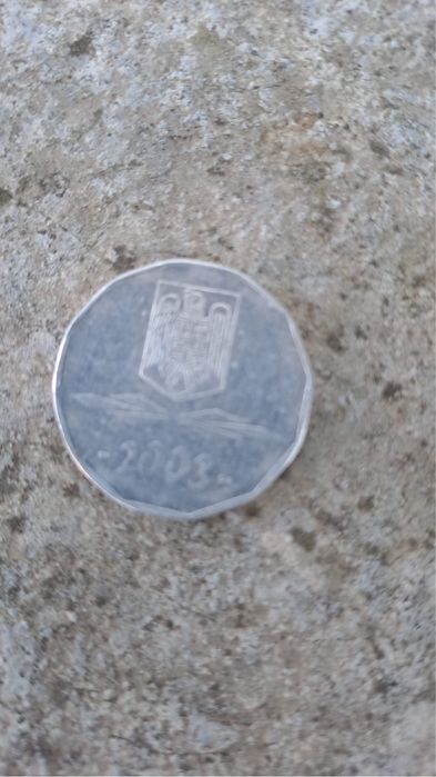 Vand moneda de 5000 lei