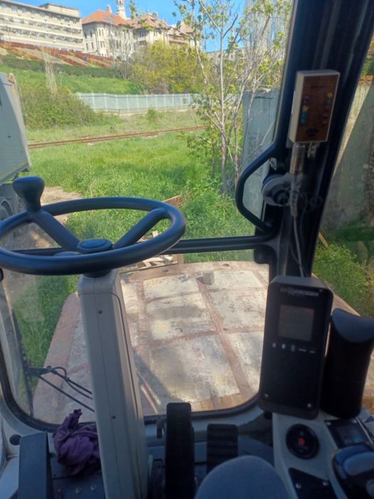 Excavator pe Roti Senneboghen 830 2010 pentru Manipulare Marfa 15m Reviziile La Reprezentanta