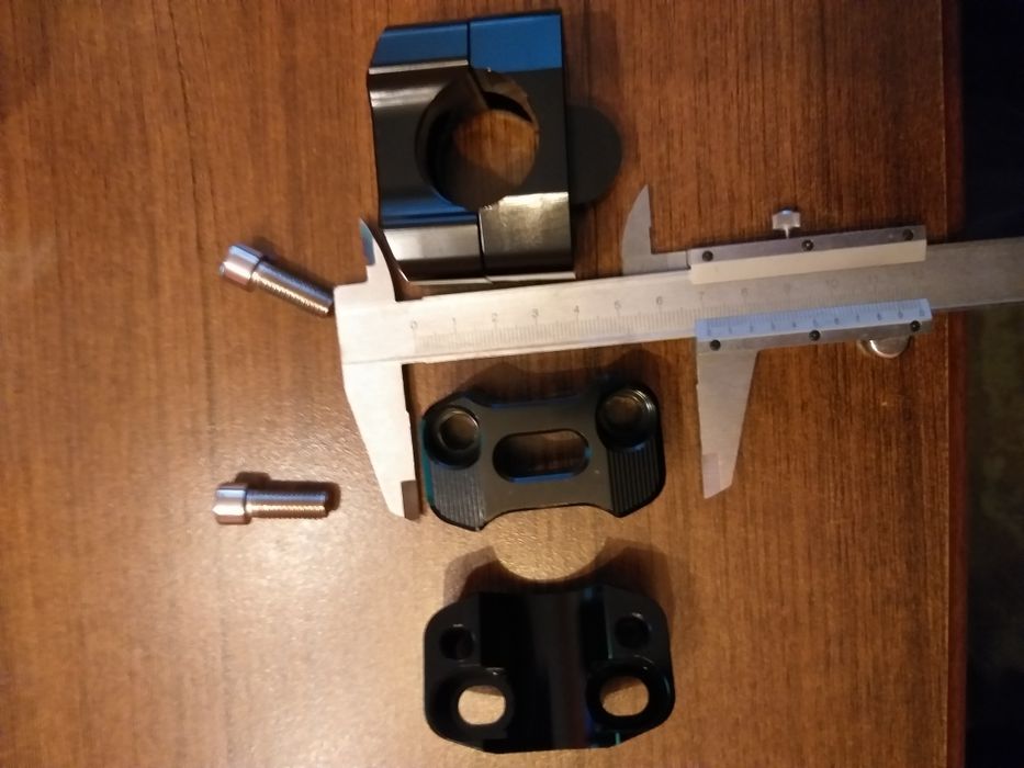 Повдигачи за мото кормило,22мм,и 28мм и преходник от 22 към 28мм