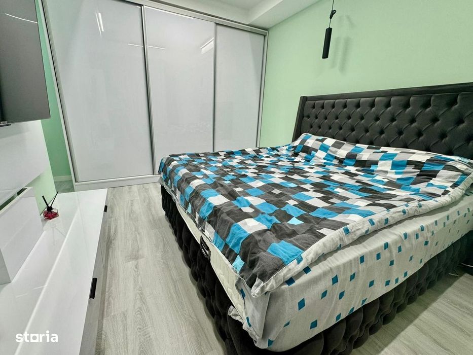COSMOPOLIS - Apartament cu 3 camere si gradina, mobilat si utilat.