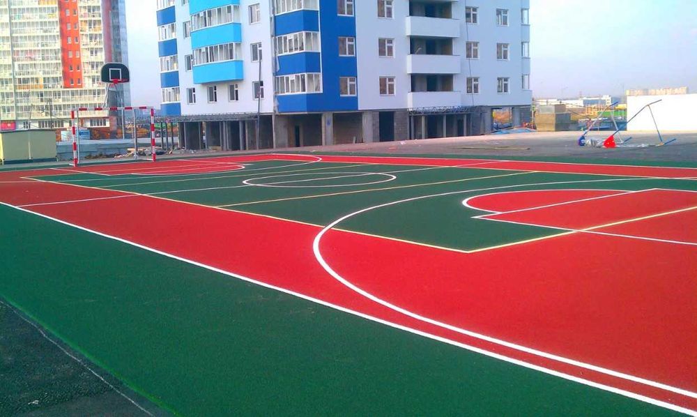 Укладка спортивных резиновых покрытий с нанесением разметки.