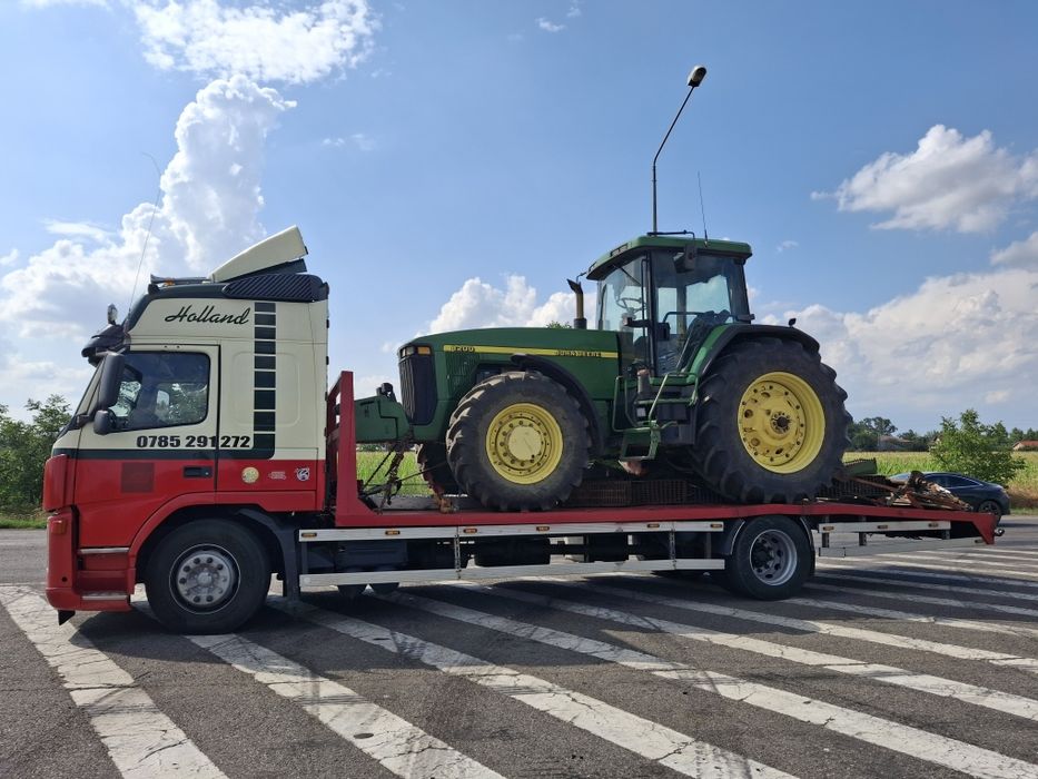 Tractari auto Alexandria si judetul Teleorman Transport Utilaje Tractor Combina Remorca Buldoexcavator Combinator Disc Met Plug
