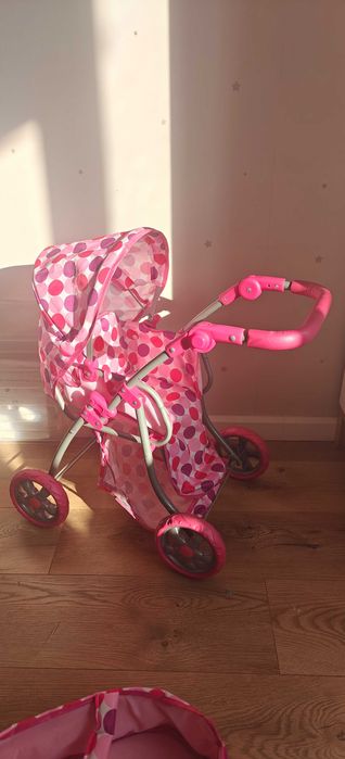 Игрушечная детская коляска