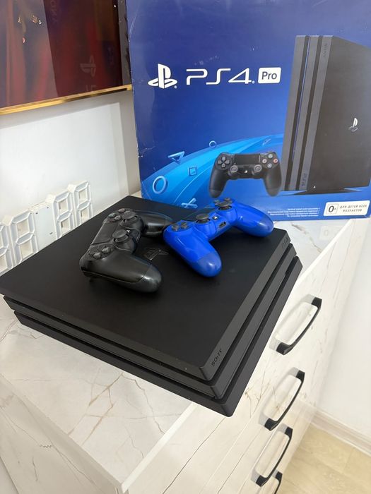 Ps 4 pro + 2 controller + физ. Игры + купленные игры