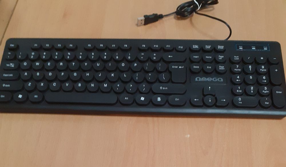 Vând Tastatura Omega cu fir,taste în relief și mufă USB