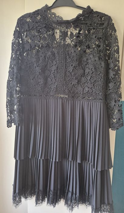 Елегантни дамски рокли