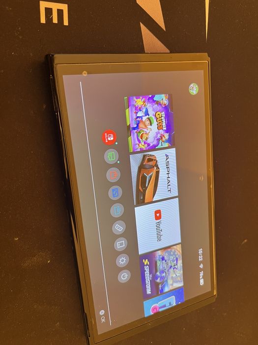 Nintenfo switch OLED + игра SpoungeBob и още инсталирани игри
