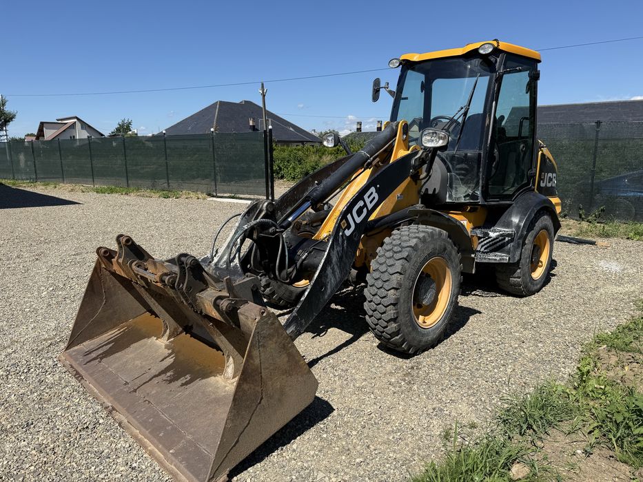 Jcb 409 vola incarcator frontal  furci cupa volvo