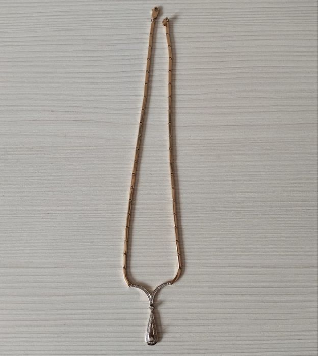 Золотое колье с бриллиантами