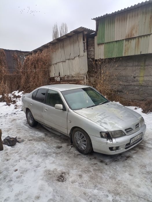 Ниссан примера п11