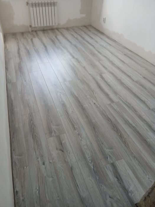 Укладка ламината и кварцвинила