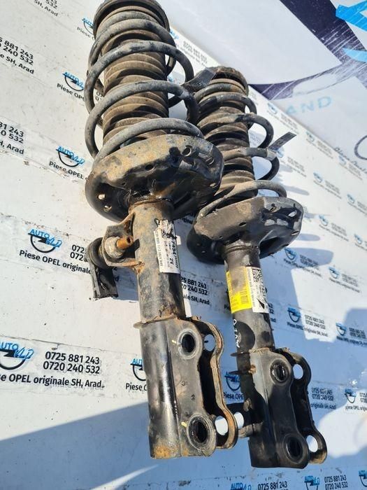 Amortizor cu arc stanga dreapta fata Chevrolet Aveo T300 1.2 benzina;