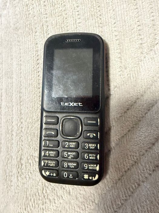 Продам телефон Texet