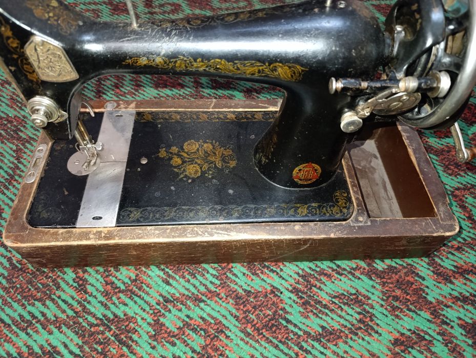 Швейная машина Зингер ручная.