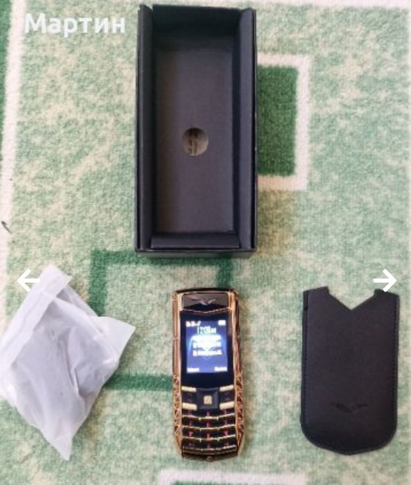 Мобилен телефон марка SERVO с две СИМ карти + кутия + зарядно - работи