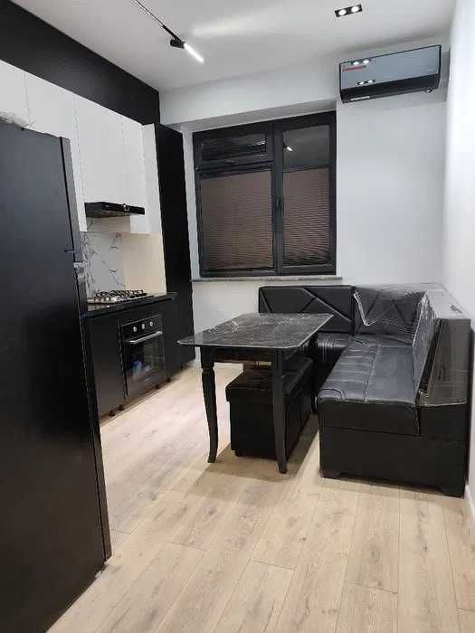 продается гнранд сити 2 комнаты 42м2  кирпич узбум*