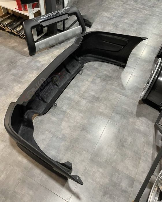 Бампер задний Toyota Caldina