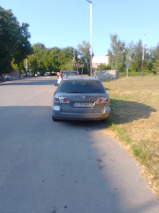 Автомобил Мазда 6