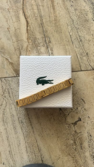 Brățară Lacoste.