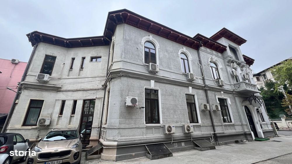 Cladire 23 de camere cu teren 554 mp