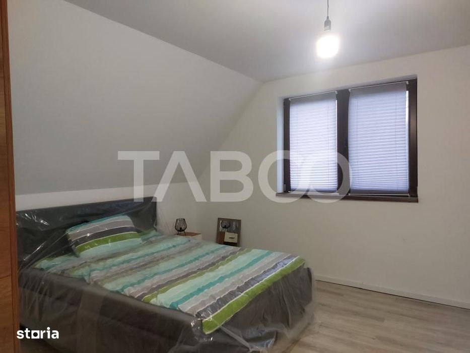 Casa individuala noua 4 camere P+M 144 mpu curte libera 416 Cisnadie
