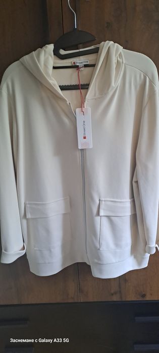 Нова Бяла,красива,елегантна жилетка,купена от Германия,не е носена