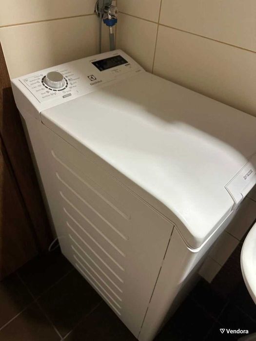 Стиральная машина Electrolux Вертикальная