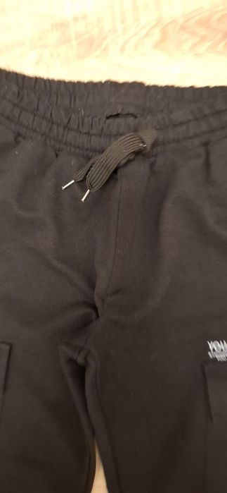 Pantaloni trening cu buzunare aplicate