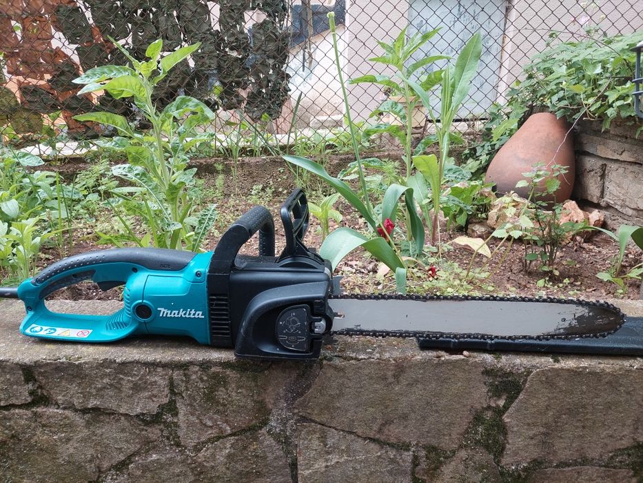 Винтоверт  Makita и електрически верижен трион  Makita UC4030 A