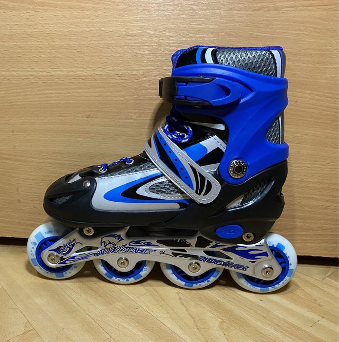 Роликовые коньки