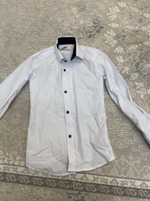 Рубашки и одежда для мальчика