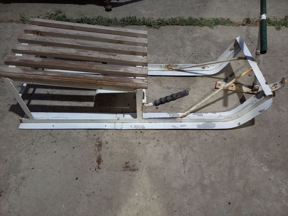 Детские сани с рулём