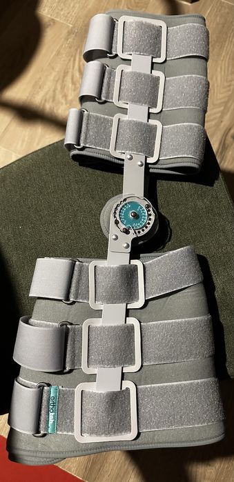 Шина за коляно (мултицентричен туторфикс) и патерици