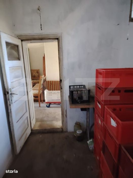 Casa cu teren, livada, lac si izvor - ideala pentru locuinta sau inves