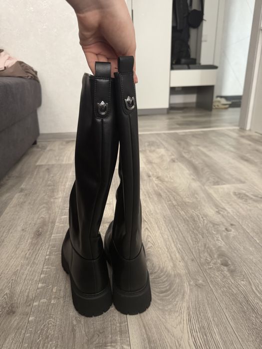 Продам новые сапоги