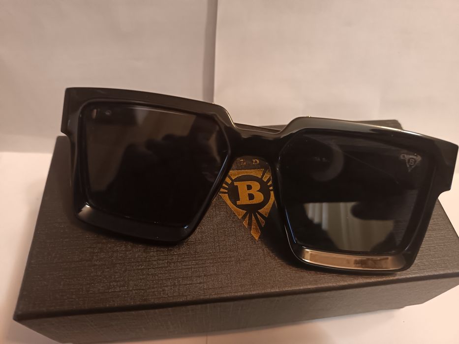 Дизайнерски слънчеви очила