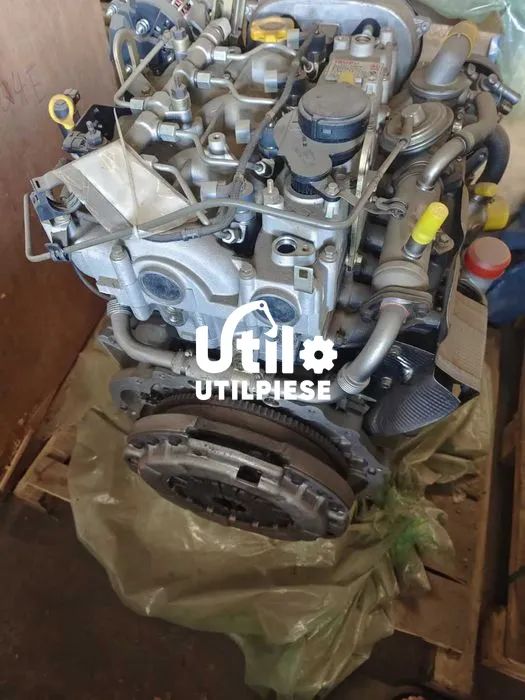 motor isuzu je4d28b jcb 3cx komatsu wb93r cat 428 + piese isuzu