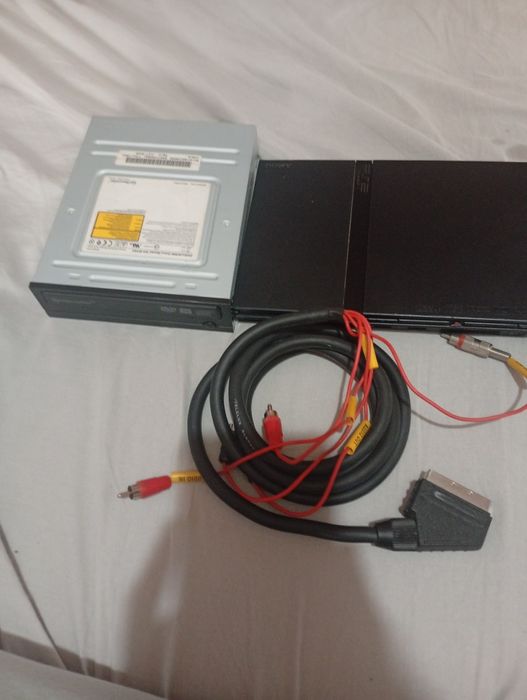 Ps2 slim cu cd și merge bine