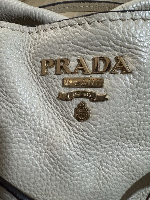 Geantă de mână Prada , din piele naturală (alb unt / crem).