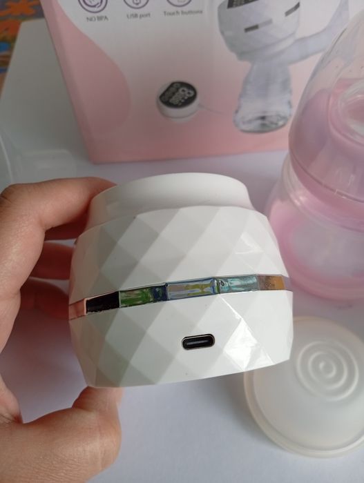 Электрический молокоотсос