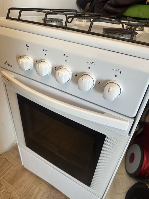 Газ плита FLAMA .