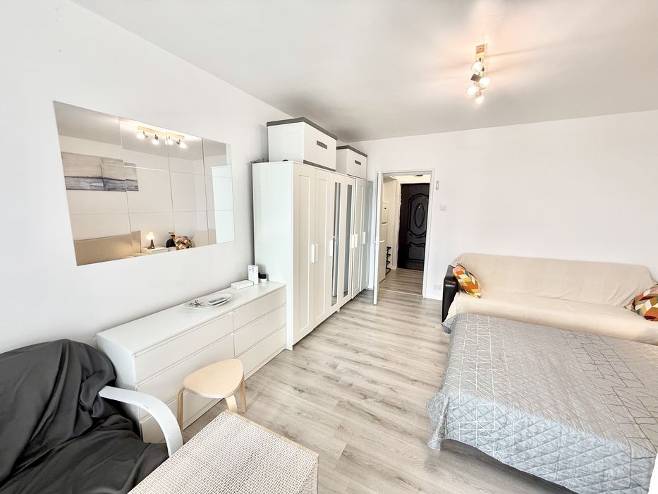 Garsoniera berceni grand arena proprietar