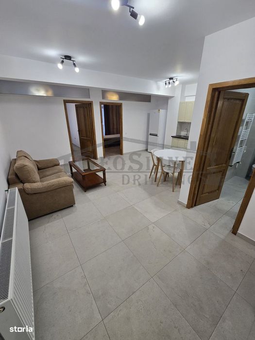 Apartament 2 dormitoare 1 Open-space Parcare exterioară inclusă
