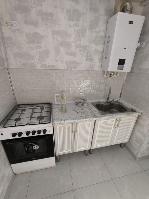 2 х комнатную квартиру Янгиюль. Новый евро ремонт. Первый этаж